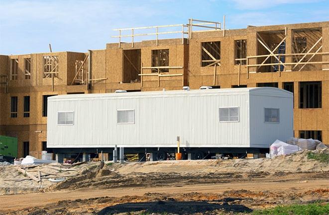 construction office rentals with signage for leasing information in Double Oak TX